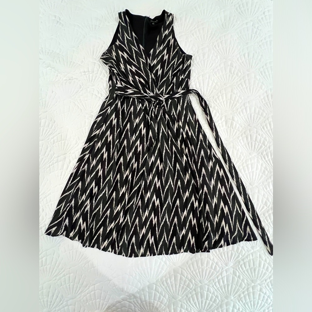Sleeveless wrap midi dress.
